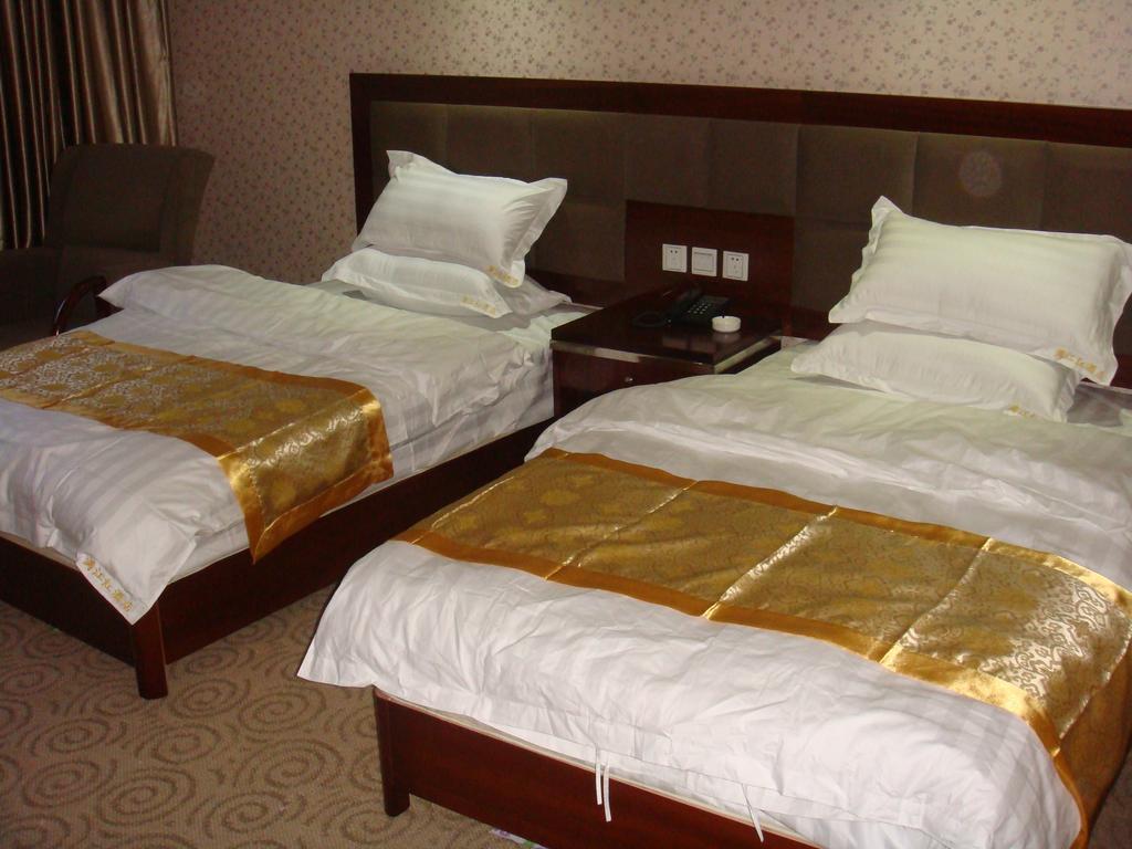 Jiuzhaigou Man Jiang Hong Hotel Csiucsajkou Szoba fotó