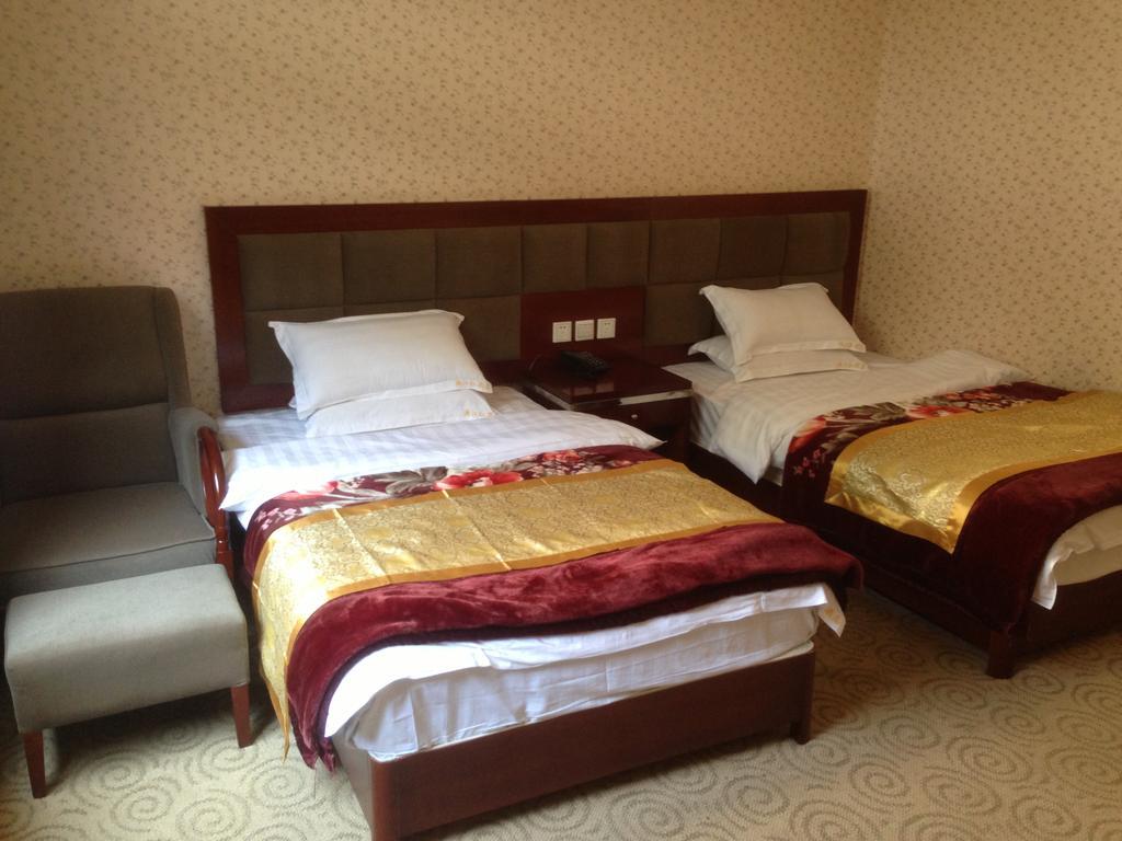 Jiuzhaigou Man Jiang Hong Hotel Csiucsajkou Szoba fotó