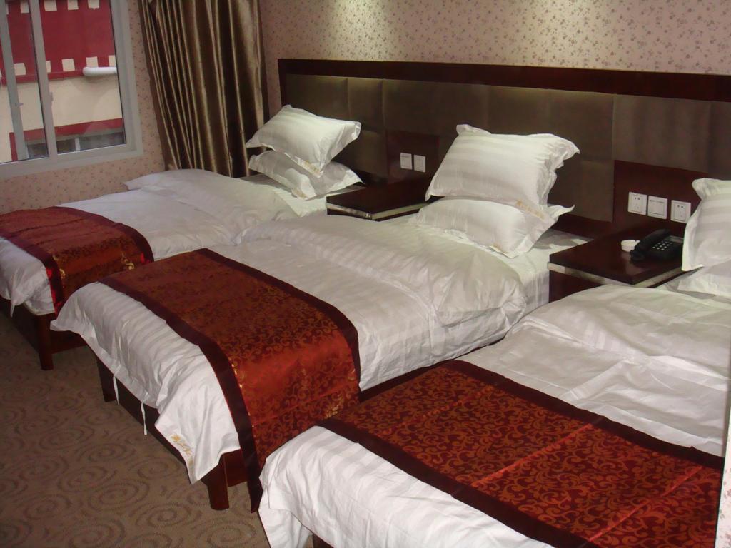 Jiuzhaigou Man Jiang Hong Hotel Csiucsajkou Szoba fotó